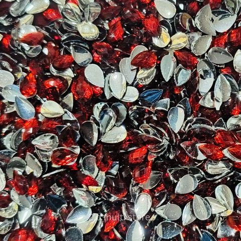 Tilagam shape kundan stones red colour